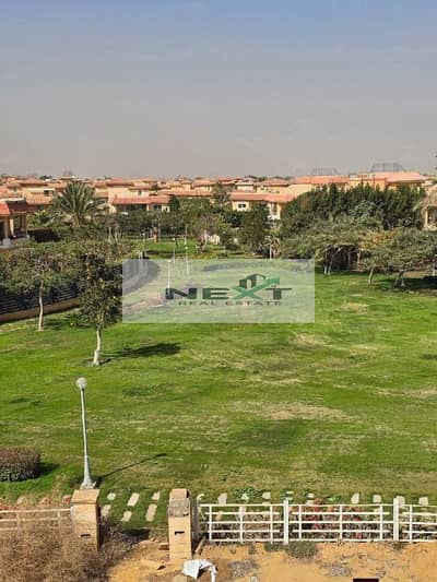 For sale in Madinaty Cash: a villa-style apartment, model K, standalone unit, on a huge private plot of 1050 sq m + 312 sq m building area, sea and we