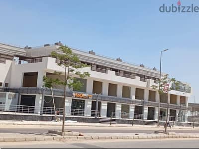 محل للايجار في 800فدان اكتوبر الجديدة ع طريق الواحات مباشرة