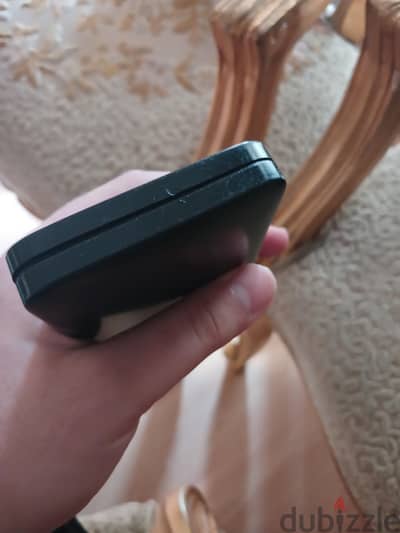 This is a Joyroom JR-T012 power bank with a 10000mAh capacity. I