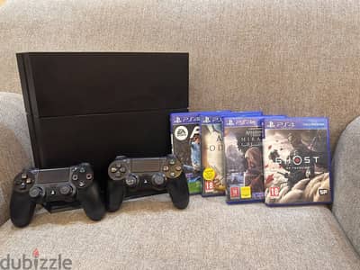 Play station 4 1 Tb - with 14 games including