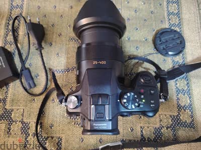 كاميرا ليومكس عدسه Lumix Fz1000 20m lens  24-400m  Leica