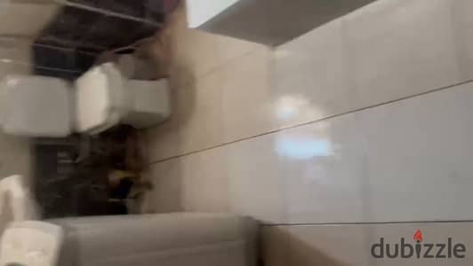 شقة للبيع ارضي مرتفع حي سادس خلف كلية صيدلة