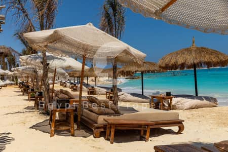 Lowest Price Fully Finished 3-Bedroom Chalet for Sale in Ras El Hekma, North Coast. Direct Sea View, Low Down Payment, and Installments over 10 Years.