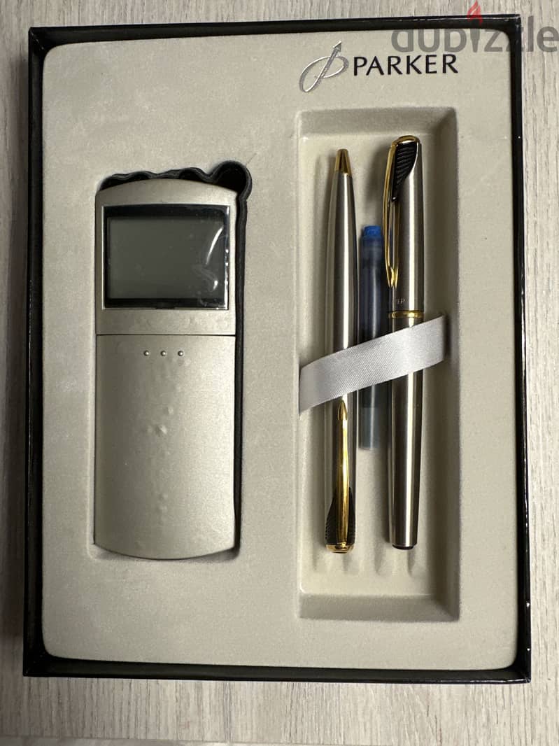 Pens and Portable Calculator 1