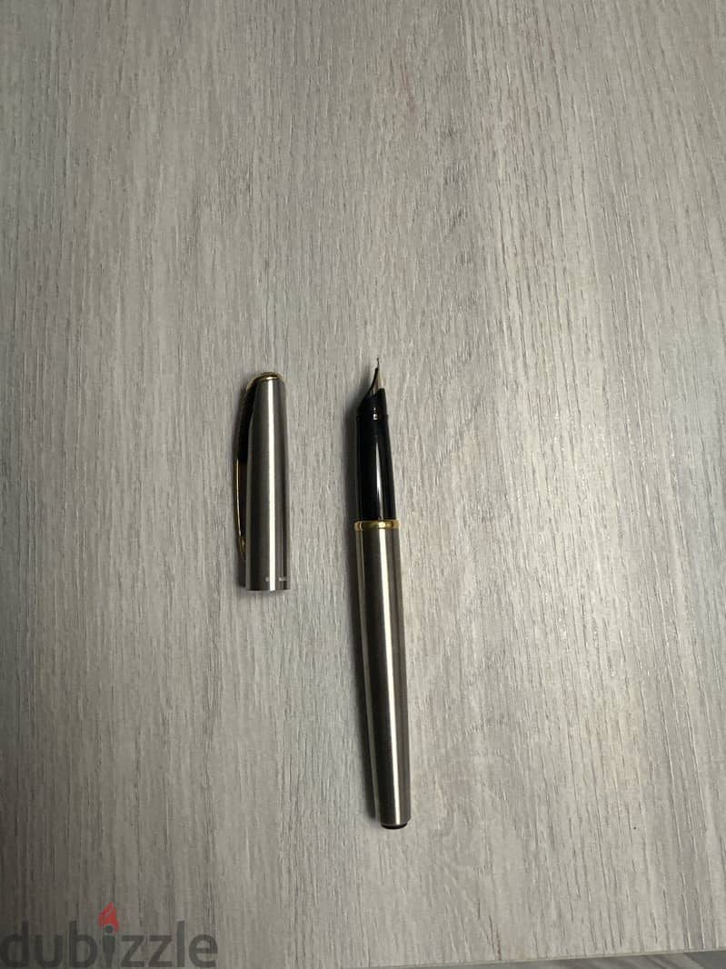 Pens and Portable Calculator 5