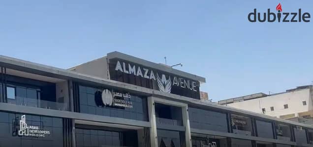 Car Showroom 600 meters for rent under the bridge, licensed showroom, Almazah