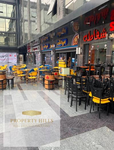 Ground floor shop, ready for immediate occupancy, currently rented with a monthly return of 80,000 in a functioning mall. Price available on installments.