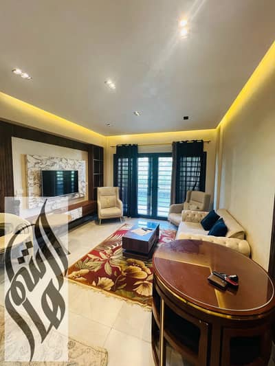 Ultra Super Lux furnished apartment for rent in Privado Madinaty, 84 sqm + 35 sqm garden, 2 bedrooms, direct lake view, prime location near services.