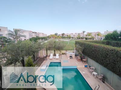 For rent: Modern, fully furnished, and air-conditioned twin house with a swimming pool in the Greens compound, Sheikh Zayed.