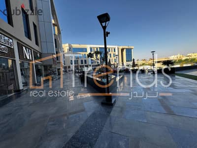 محل دور أرضى للايجار فى مول ايتيرنا ميفيدا التجمع  موقع مميز جدا امام بوابة 2 ميفيدا - اعمار التجمع الخامس  مناسب جدا للمطاعم والكوفى شوب!