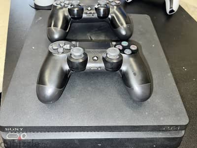 Playstation 4 slim with 2 controllers