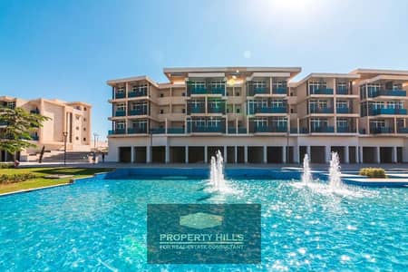 شقة بانورامية علي فيو النافورة 125 متر في Nyoum October بجوار Mountain View و Grande Heights