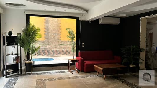 Duplex for sale in Al Yasmin 6 Villas, 440m² + 196m² garden, 4 bedrooms and 4 bathrooms, modern finishing, with private swimming pool and garden view.