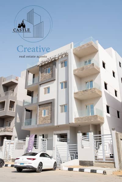 Apartment for sale with full finishing including flooring front facing with elevator access located in New Cairo close to Mohamed Naguib Axis