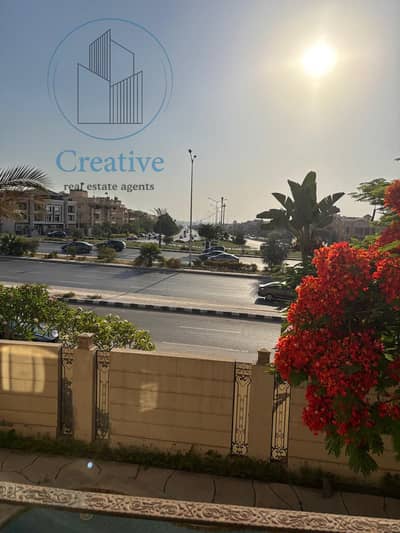 Apartment for Sale, ground floor with a private garden and a distinctive view,. Immediate delivery with installments over 1 year. Located in Al Yasmeen