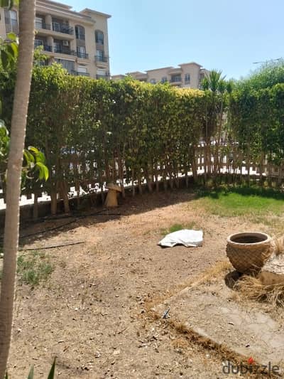 Ground floor apartment with garden for sale in Al Rehab 2