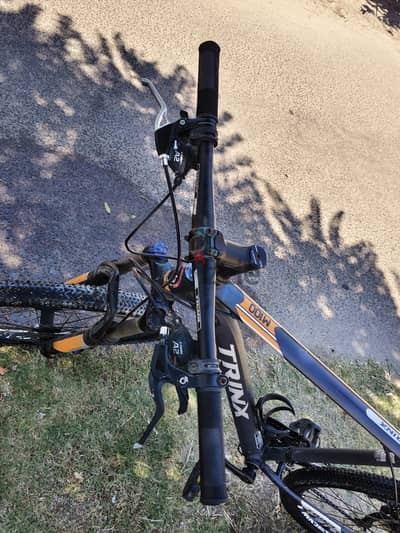 Trinx m100