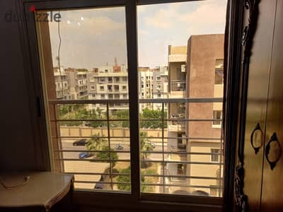 : For sale Dar Misr Al Qarnafal: 130m corner apt near Gate 7.3 beds (1 master), 2 baths, reception, kitchen. Price 4M EGP. Contact: [Phone Number]