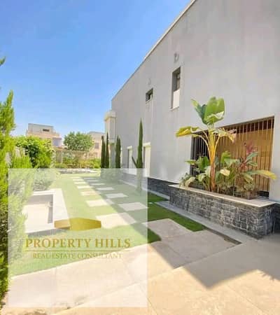 For sale due to necessity: a prime villa in the Green Belt compound, Sheikh Zayed.
