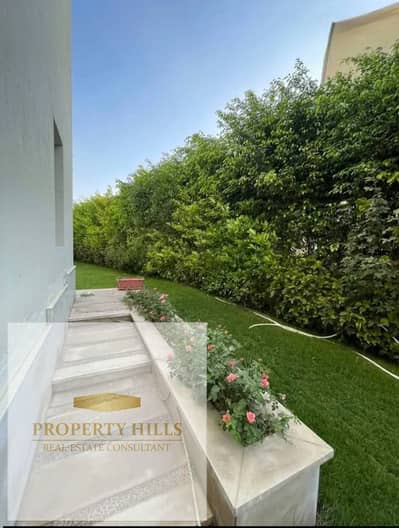 For sale due to necessity: a prime villa in the Green Belt compound, Sheikh Zayed.