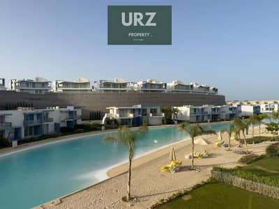 First row lagoon view chalet for sale on the North Coast fully finished with ACs and a special discount near Almaza Bay Modon Hacienda