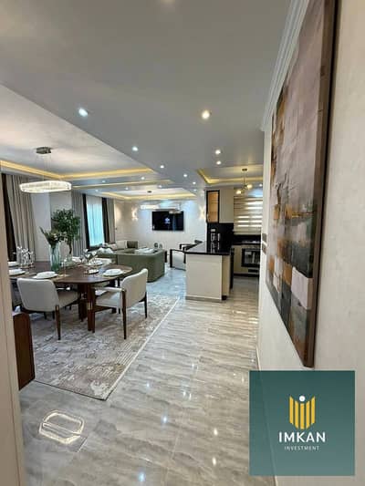 3-bedroom apartment for sale in the Amorada compound, Fifth Settlement (New Cairo). The unit measures 220 sqm, overlooks the swimming pool, and featur