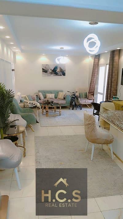 Available apartment for sale in Madinaty in the first phases B2 total area 135 meters garden view completely finished consisting of 3 rooms and 2 bathrooms very distinctive location and steps to services the asking price is 7 million and 300 thousand cash