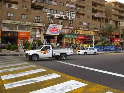 للبيع محل تجاري بمجمع الامريكيه الحصري