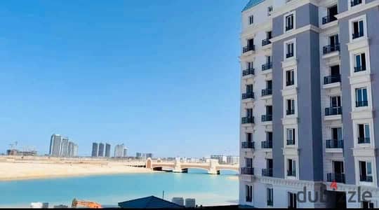 For quick sale, a 4bedroom apartment with a view of the lagoon, ready to move in, fully finished, super lux and installments up to 10 years