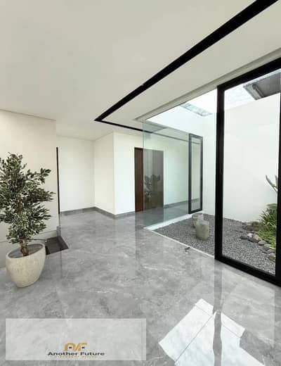 An exceptional, fully finished apartment with a private garden, located in a prime spot within the Green Belt (Al-Thawra Al-Khadra) compound.