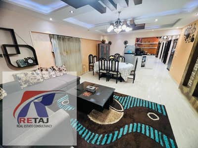 Furnished apartment for rent in a modern building directly behind Al-Manhal School, overlooking Mustafa El-Nahhas Street, Nasr City.
