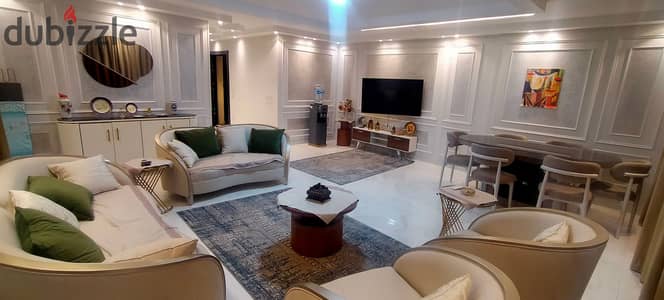 In a new building, furnished hotel apartment with new furniture overlooking the Revolution Square, 230m, fully furnished, luxury entrance, prime location, steps to the Hunting Club