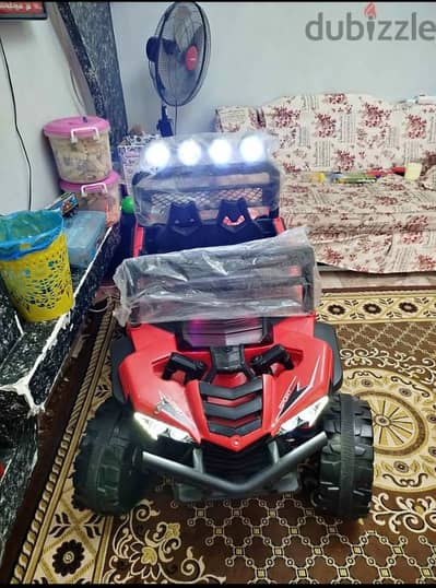 سيارة اطفال كهربائيه