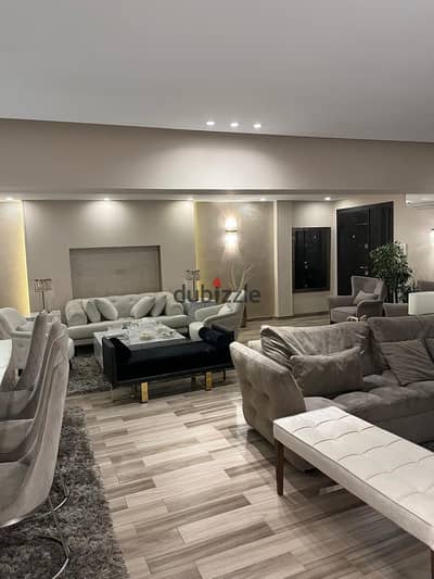 For sale, a raised ground floor apartment with an area of 250m, with a private garden and private entrance in Zahra Al-Maadi, section seven, near Al-Waha French School, chic building, elegant entrance