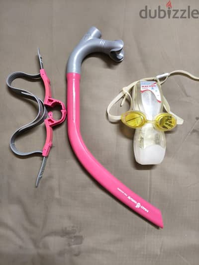 swim glasses and tube