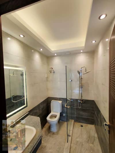 Exclusive Opportunity in Mountain View iCity: Fully Finished Ready-to-Move Ground Apartment with ACs & Private Garden in Club Park, New Cairo