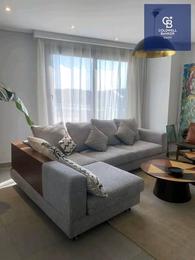 Fully finished 3-bedroom apartment with a garden for sale in Badya Palm Hills, 6th of October City; available with a down payment and a long-term inst