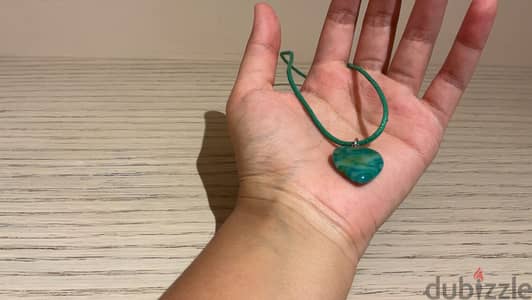 Necklace with a heart shaped charm