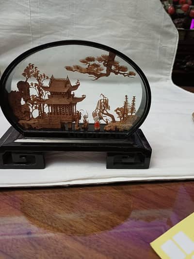 vintage hand carved cork. . . تحفة عتيقة مجسم  منحوت داخل اطار
