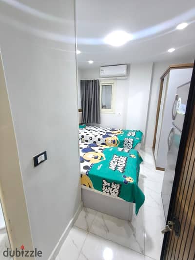 Studio available for rent, first residency in Sixth of October City, First Neighborhood, Sixth Block, Third Floor, originally Nasir, inclusive of all services, steps to Al-Hosary Mosque, all services available