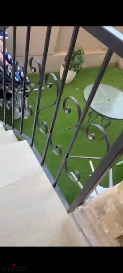 Apartment for sale, raised ground floor with garden, main street, Fifth District, Sheikh Zayed