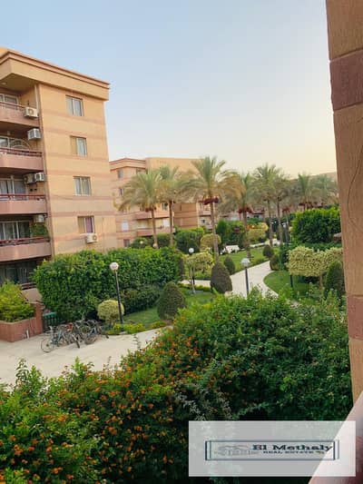 Freehold apartment for sale in Al Rehab City, New Cairo, with a wide garden view.