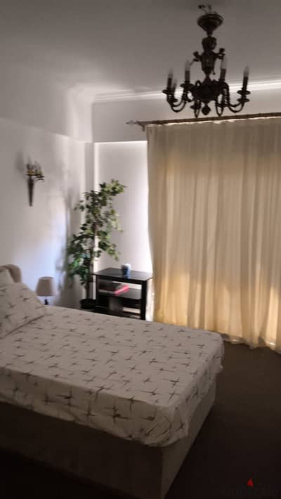 One-bedroom apartment with a reception and furnished roof in Al Yasmeen Compound, Sheikh Zayed