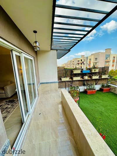 Furnished apartments for rent in Zayed Regens Compound, ground floor with garden next to Al Ahly Club