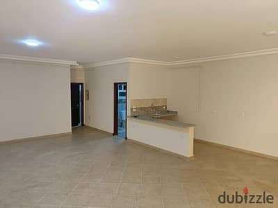 Apartment for rent, two bedrooms, ground floor, low-rise, with a private tiled garden in Al-Nargis, Fifth Settlement