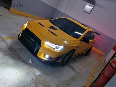 Mitsubishi Lancer 2015 متعدله Evo