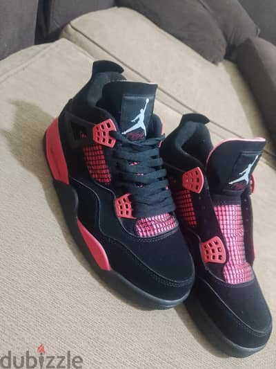 حذاءAir Jordan 4 Red Thunder (Crimson)