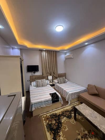 Available studio for rent in Sixth of October City, First District, near the first neighborhood, very spacious, quarter floor, elevator included, water and electricity card, close to all services, steps away from Al-Hosary Mosque.