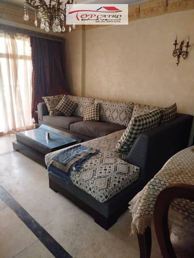 **B11 Apartment for Rent**  * **Size:** 96 sqm * **2 Bedrooms** * **2 Bathrooms** * **Fully Air-Conditioned** * **Open Kitchen** * **Garden View**  **