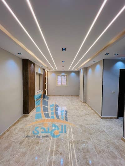 Apartment for sale, located at the rear of a main street, Simsimah Street, near all services in Hadayek Al Ahram. Prime location, area L. 106 square